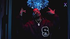 Snoop Dogg, inviato speciale a Cortina, porta alle Olimpiadi invernali i suoi 30 anni di stile