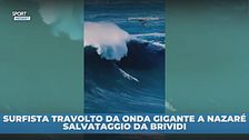 Surfista travolto da onda gigante, salvato in extremis