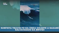 Surfista travolto da onda gigante, salvato in extremis
